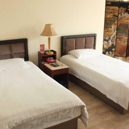Fortune Business Hotel Циндао Экстерьер фото